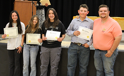 Students holding awards
